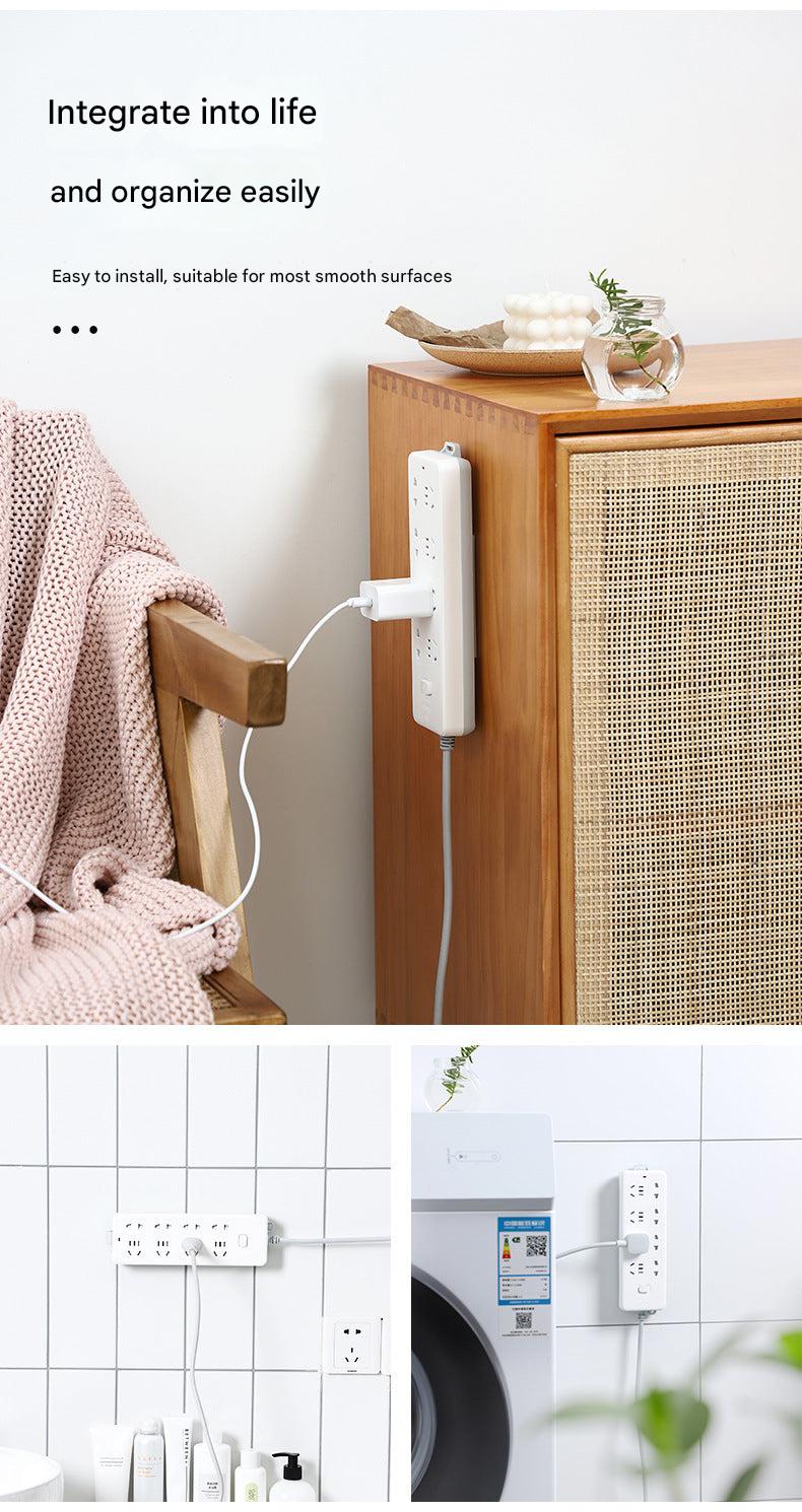 Wall-mounted power strip organizer in green