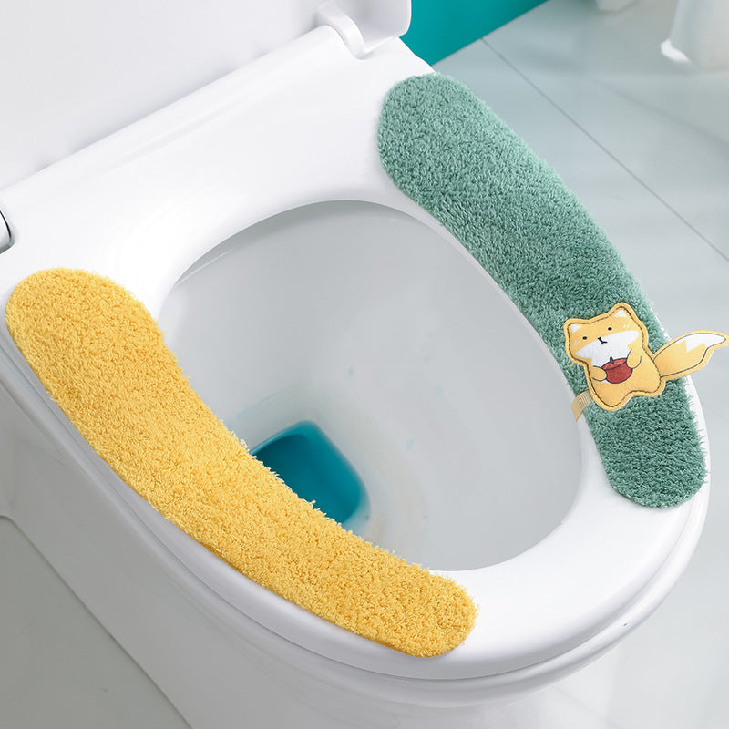Comfortable plush toilet seat cover on a toilet