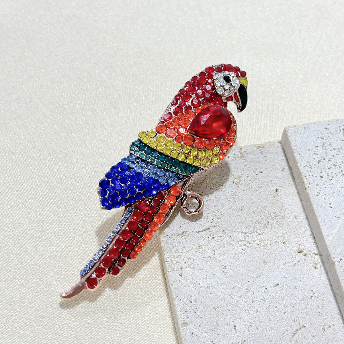 Red parrot brooch with rhinestones