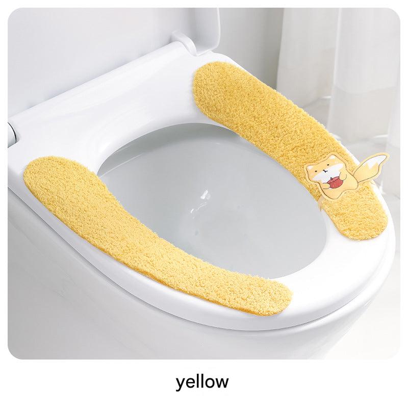 Plush toilet seat cover in yellow color