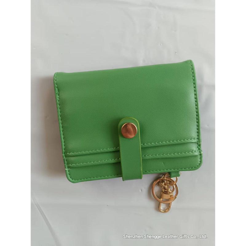 women's short wallet displayed on table