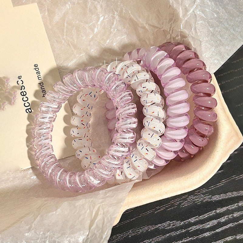 Durable plastic hair tie in Grape color