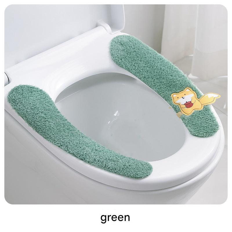 Adhesive backing feature of toilet seat cover