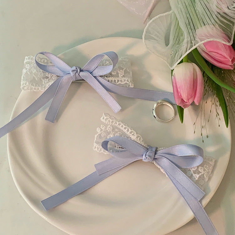 Charming bow hair clip in black