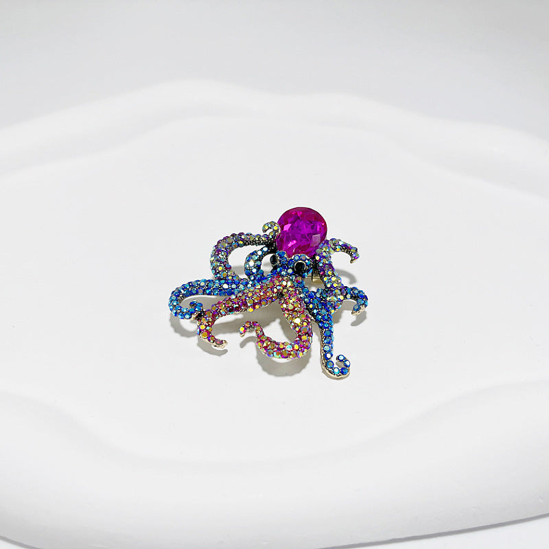 Stylish octopus brooch with rhinestones front view