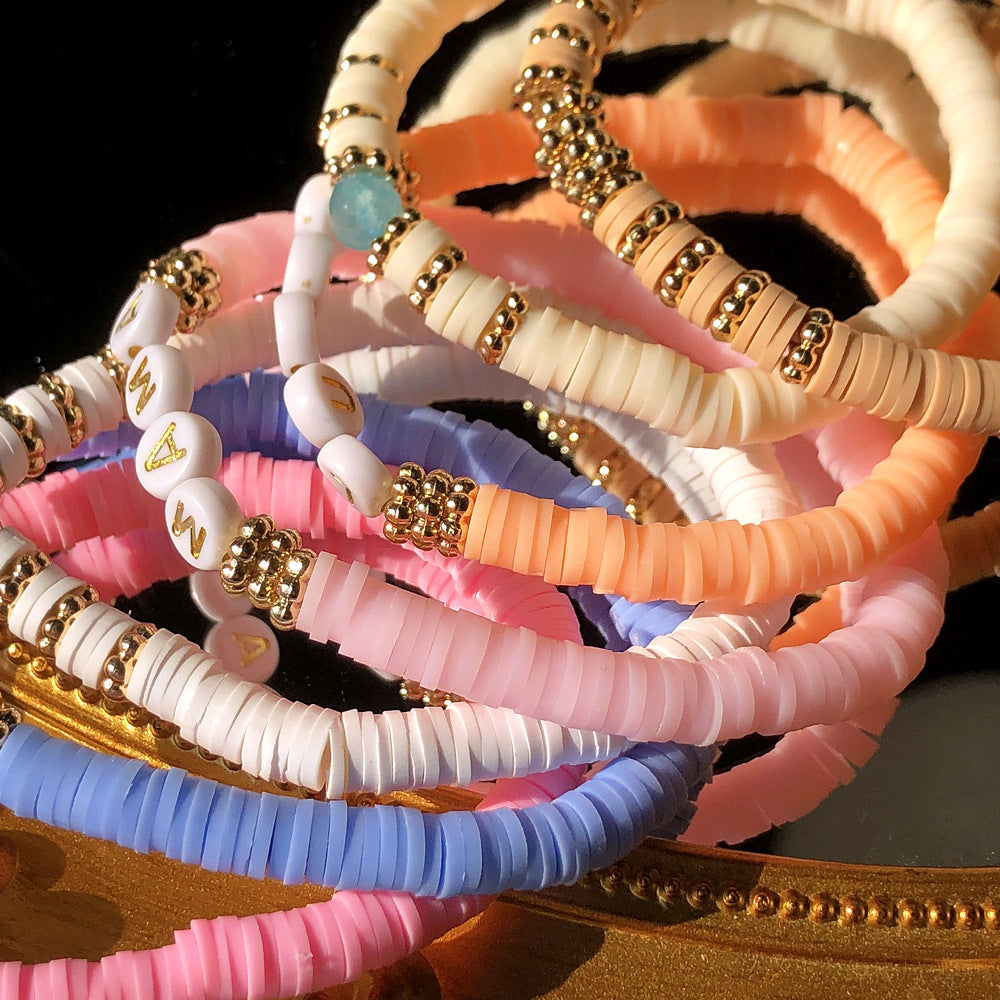 Close-up of colorful geometric charm bracelet - image 2