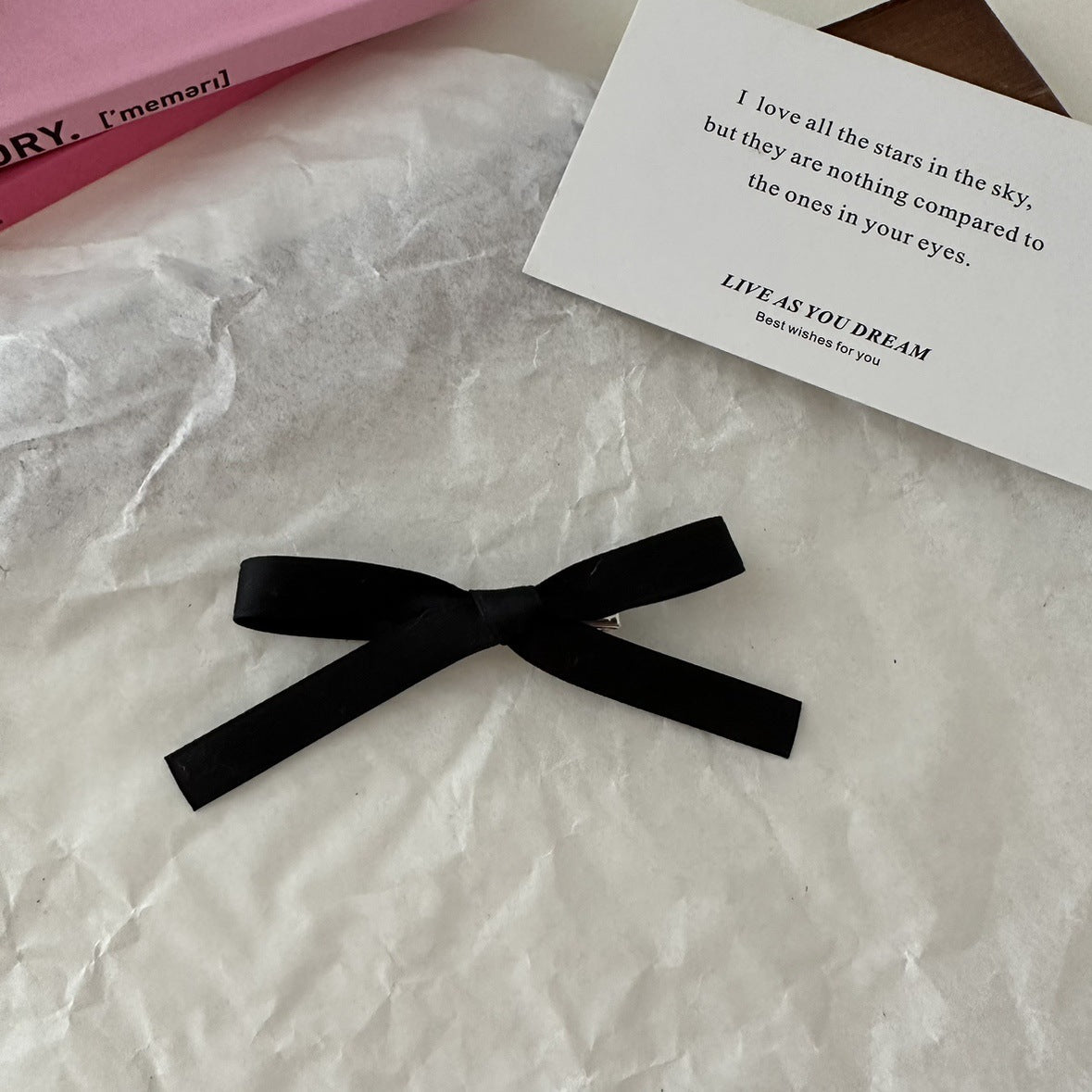 Charming bow hair clip in black