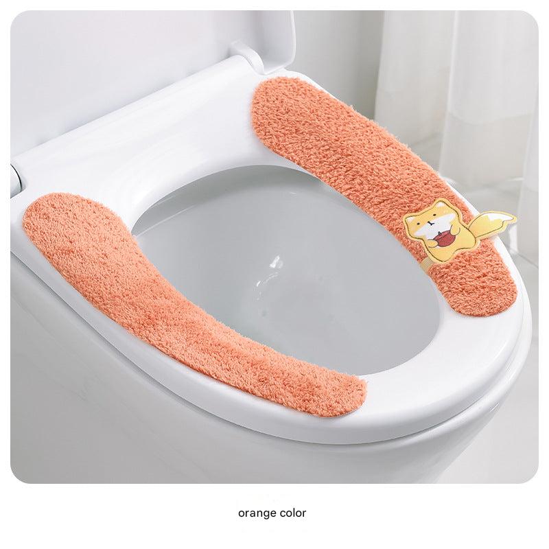 Comfortable plush toilet seat cover on a toilet