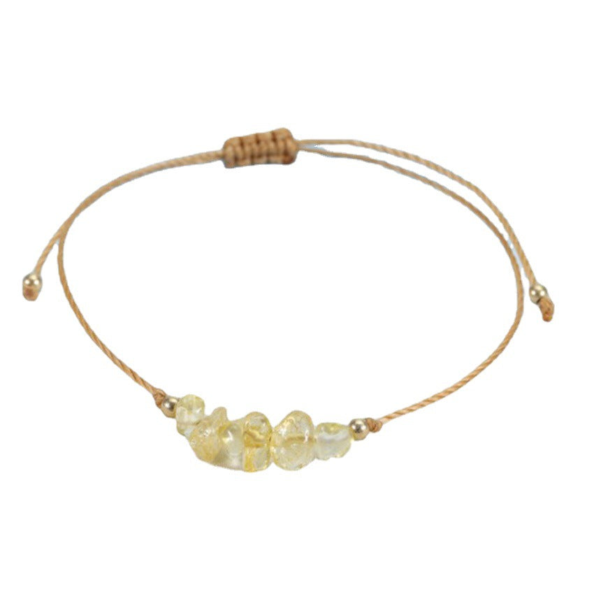 Elegant handcrafted bracelet displayed on a wooden surface