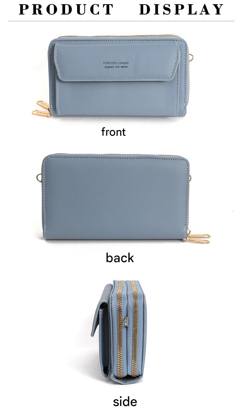 Black compact handbag featuring zipper closure
