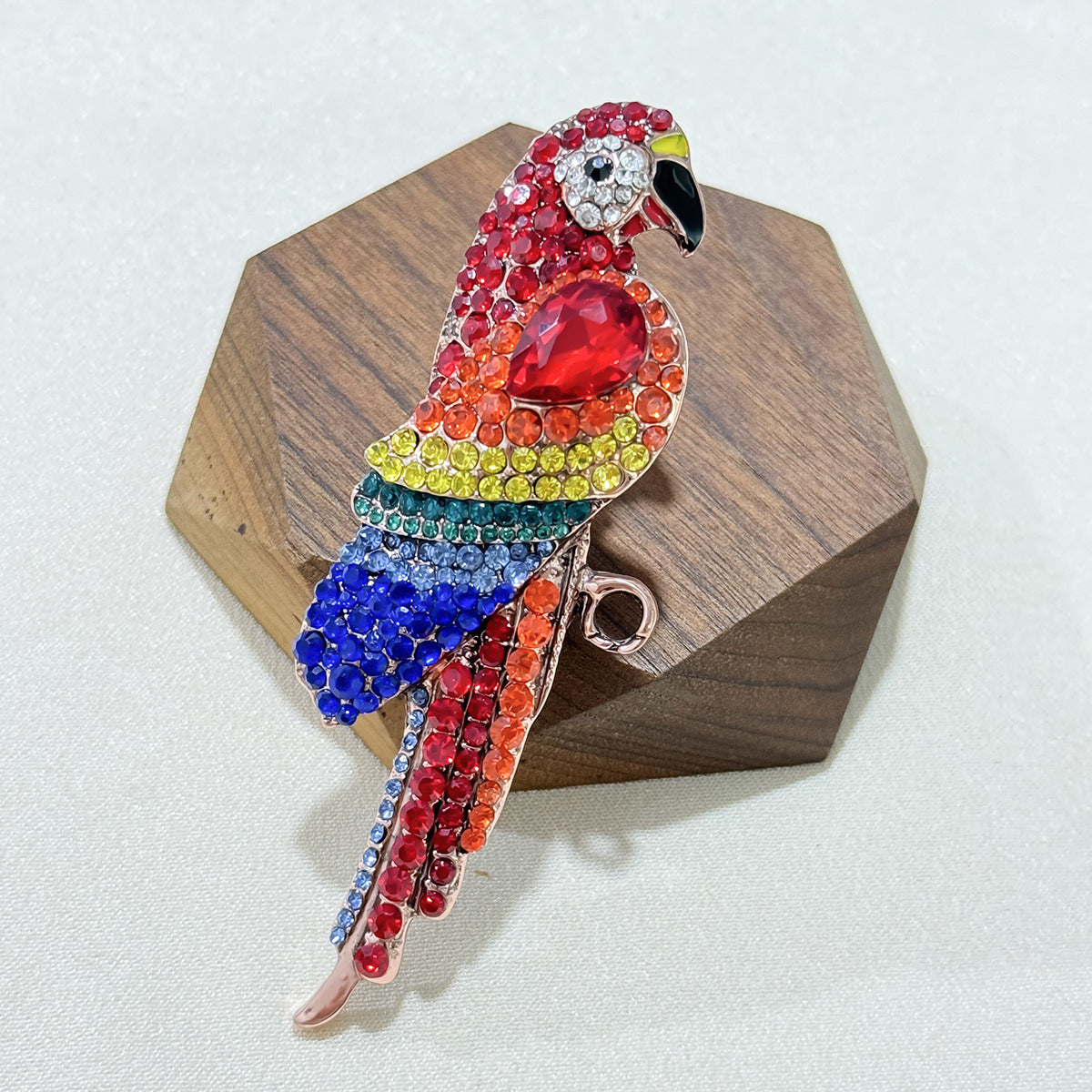 Close-up of alloy parrot brooch