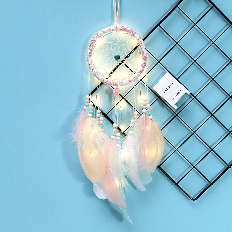 Heart-shaped dreamcatcher with lights for wedding decor