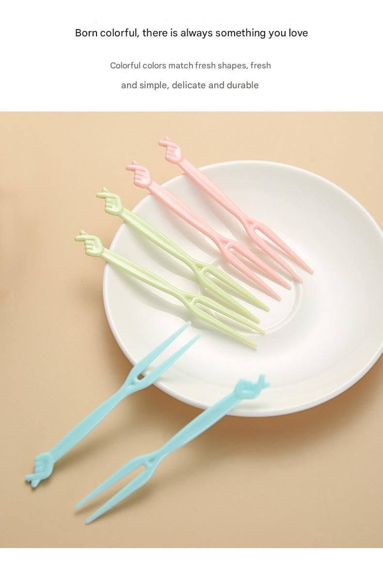 close up image of colorful disposable forks