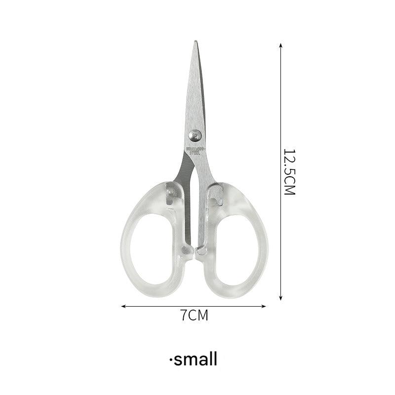 Hands using scissors for craft projects