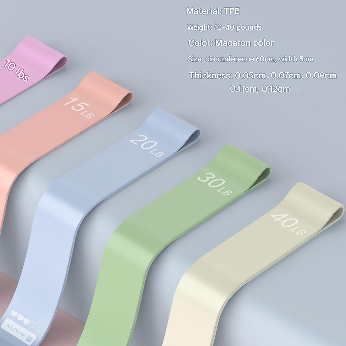 Yoga resistance bands in purple and pink