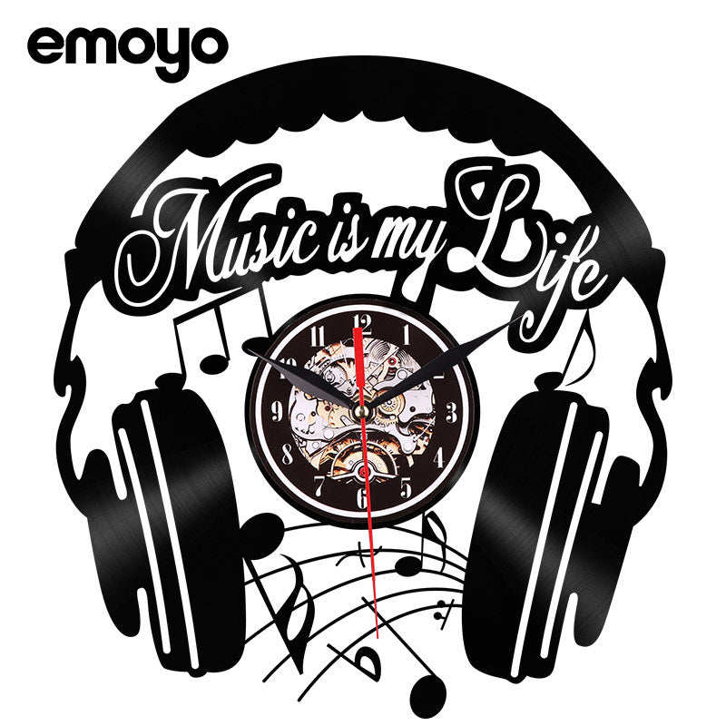 Interior with black vinyl wall clock adding decor