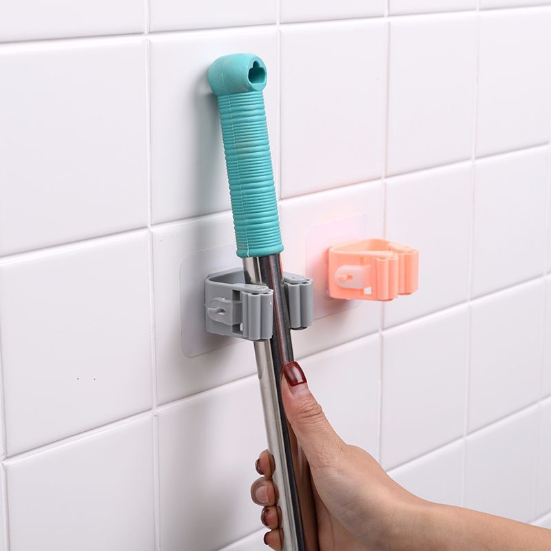 Wall-mounted mop holder for kitchen