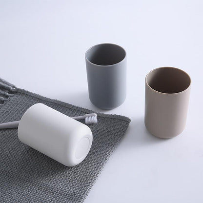 Bathroom toothbrush cup storage