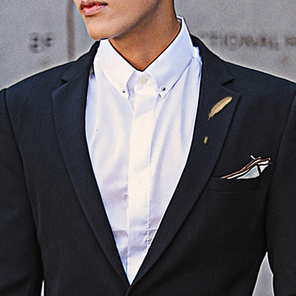 Feather brooch business suit accessory