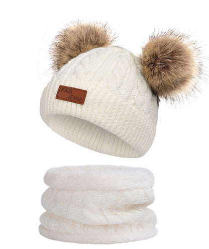 Colorful pom-pom knit hat for children