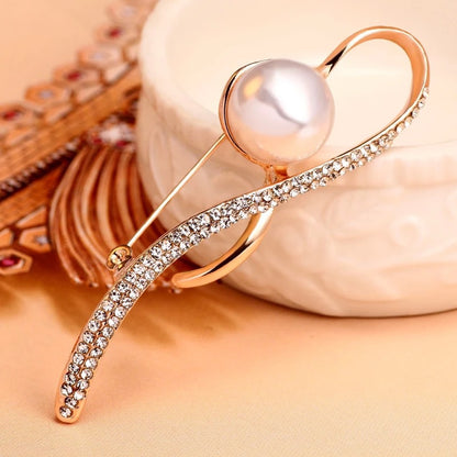 Rhinestone embellished brooch on a dress image 5