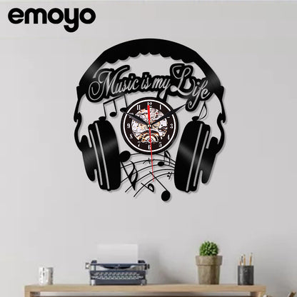 Artistic music-themed black vinyl clock on display