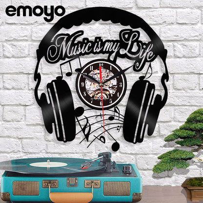 Stylish black vinyl wall clock with music design