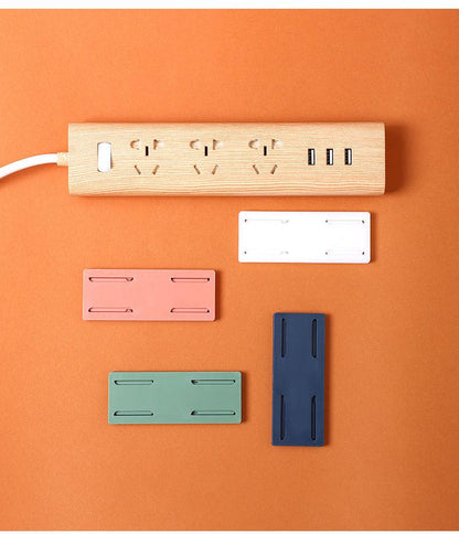 Wall-mounted power strip organizer in pink
