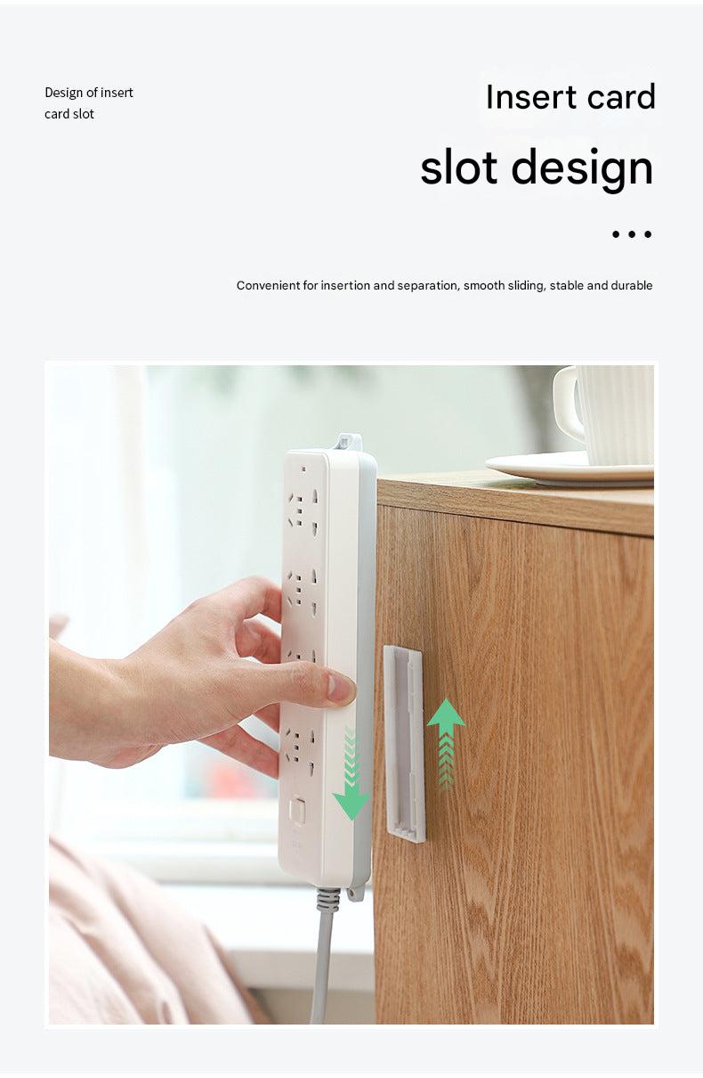 Wall-mounted power strip organizer in green