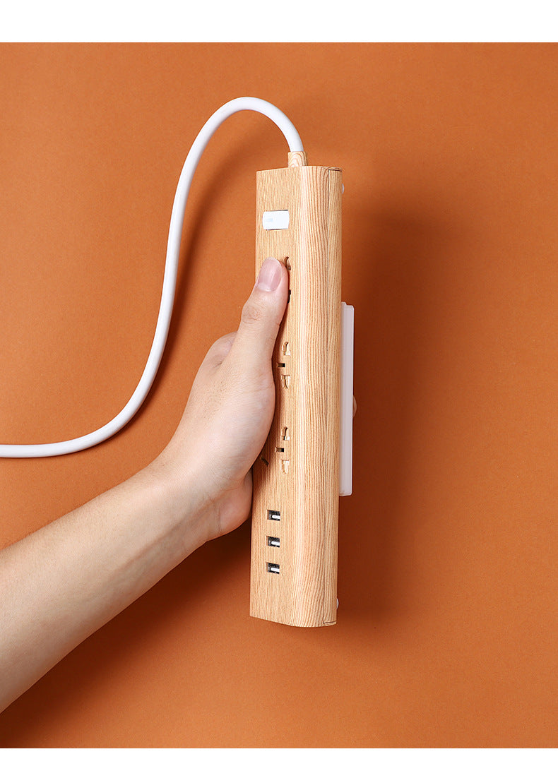Wall-mounted power strip organizer in white