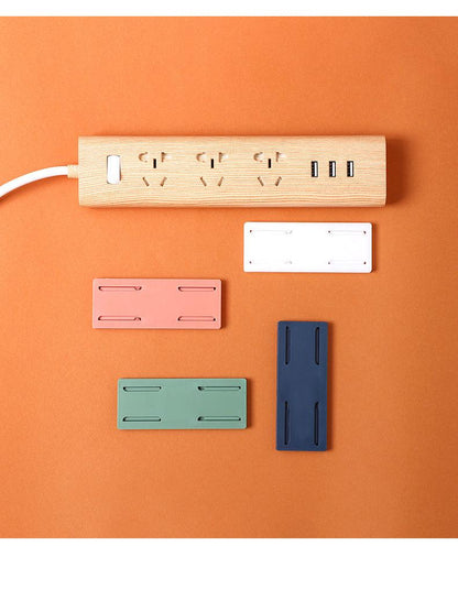 Wall-mounted power strip organizer in blue