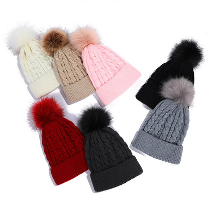 Knit beanie hat beige with pom pom