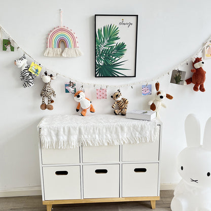 Party setup with multiple photos on string display - image 4