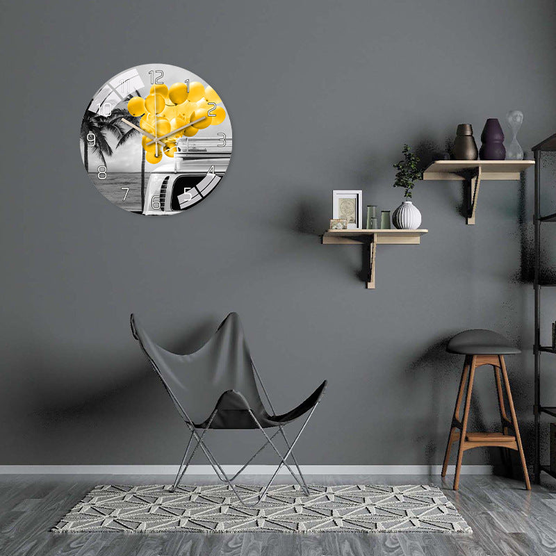 Stylish glass wall clock on the wall