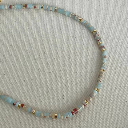 Colorful beaded necklace on display