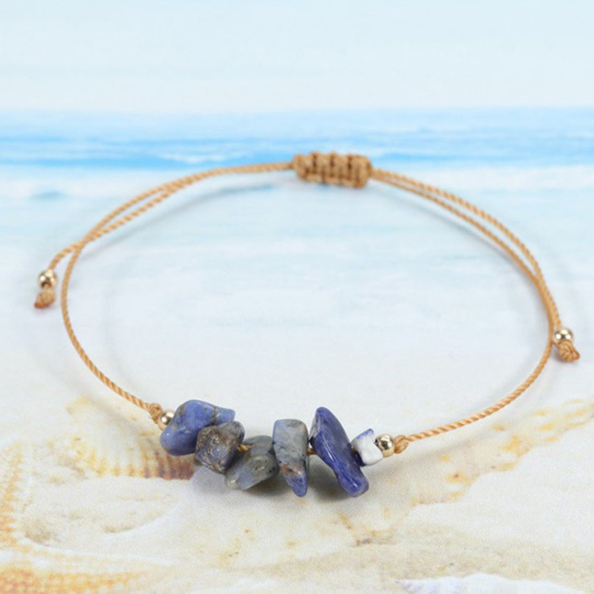 Handcrafted colorful crystal bracelet on a white background