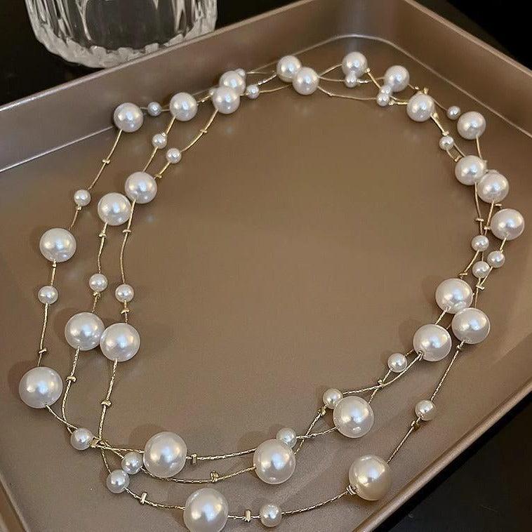 Luxurious pearl necklace hanging elegantly