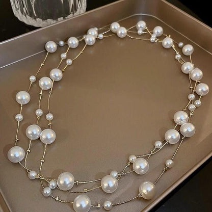 Luxurious pearl necklace hanging elegantly