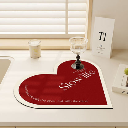 Diatomaceous countertop mat for splashes