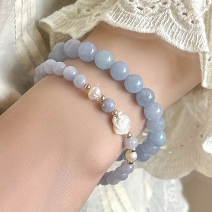 Close-up of blue beaded bracelet image 2