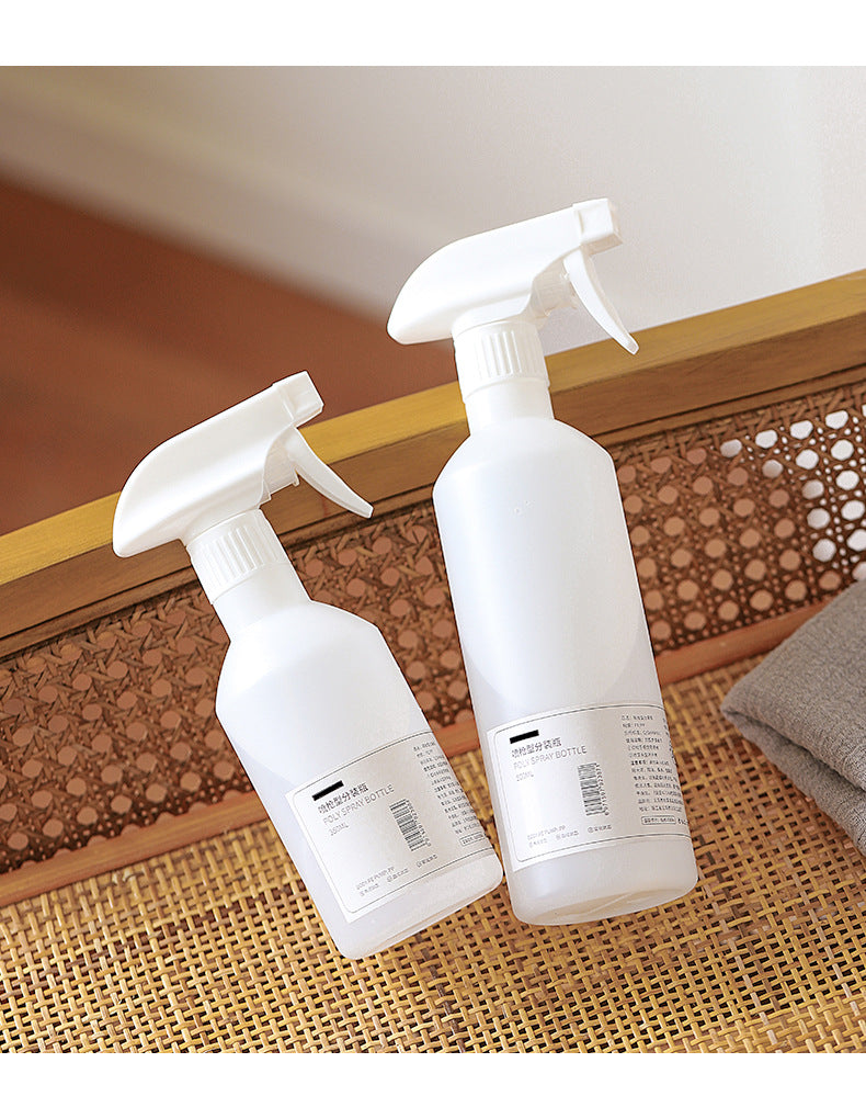 Alcohol spray bottle in use 2