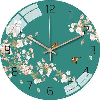 Stylish glass wall clock on the wall