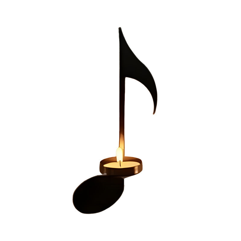 Artistic iron wall-mounted candle holder