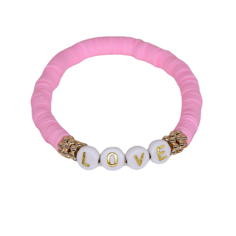 Various colors of polymer clay bracelets together - image 4