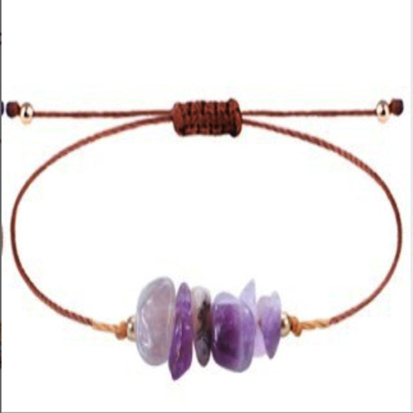 Elegant handcrafted bracelet displayed on a wooden surface