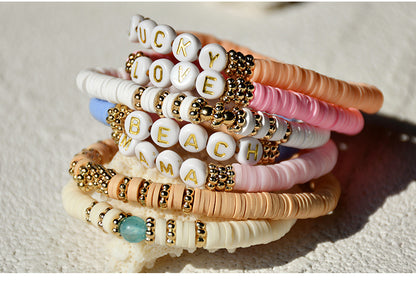 Collection of friendship bracelets in different colors - image 10