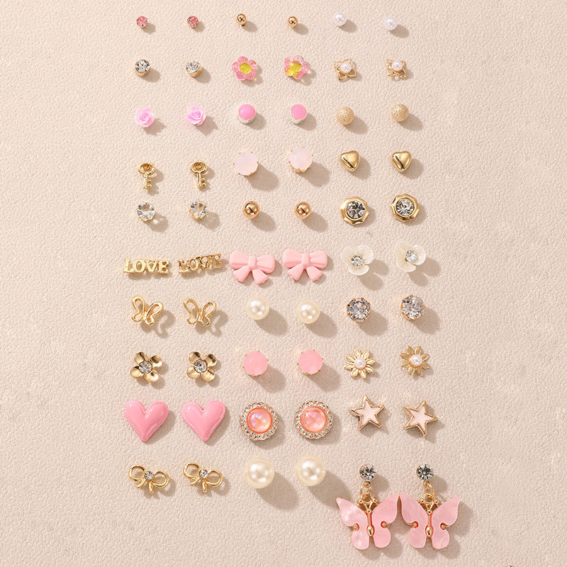 Lightweight stud earrings on display image 7