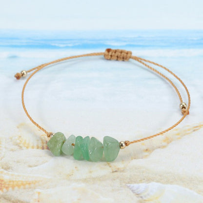 Handcrafted colorful crystal bracelet on a white background