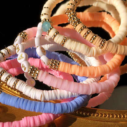 Close-up of colorful geometric charm bracelet - image 2