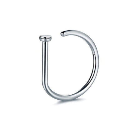 close-up of hip hop nose ring in gold color image 2